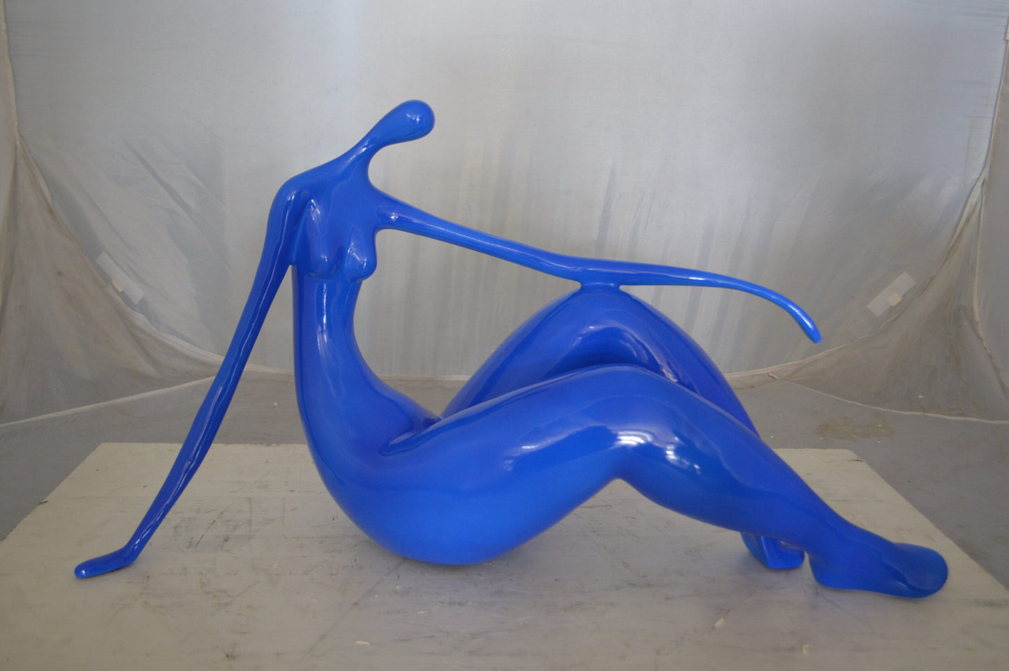 Modern Art Blue Women on the Beach Resin Statue -  Size: 27"L x 8"W x 15"H.