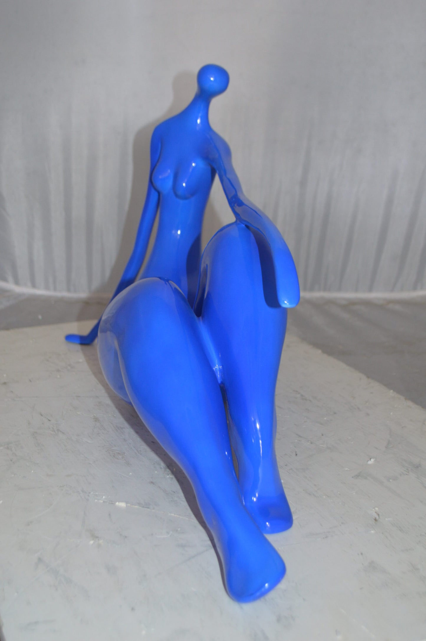 Modern Art Blue Women on the Beach Resin Statue -  Size: 27"L x 8"W x 15"H.