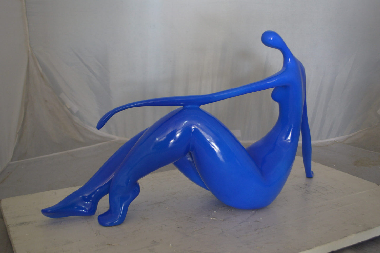 Modern Art Blue Women on the Beach Resin Statue -  Size: 27"L x 8"W x 15"H.