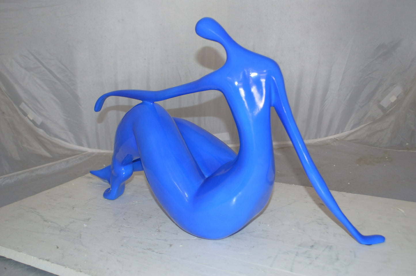 Modern Art Blue Women on the Beach Resin Statue -  Size: 27"L x 8"W x 15"H.