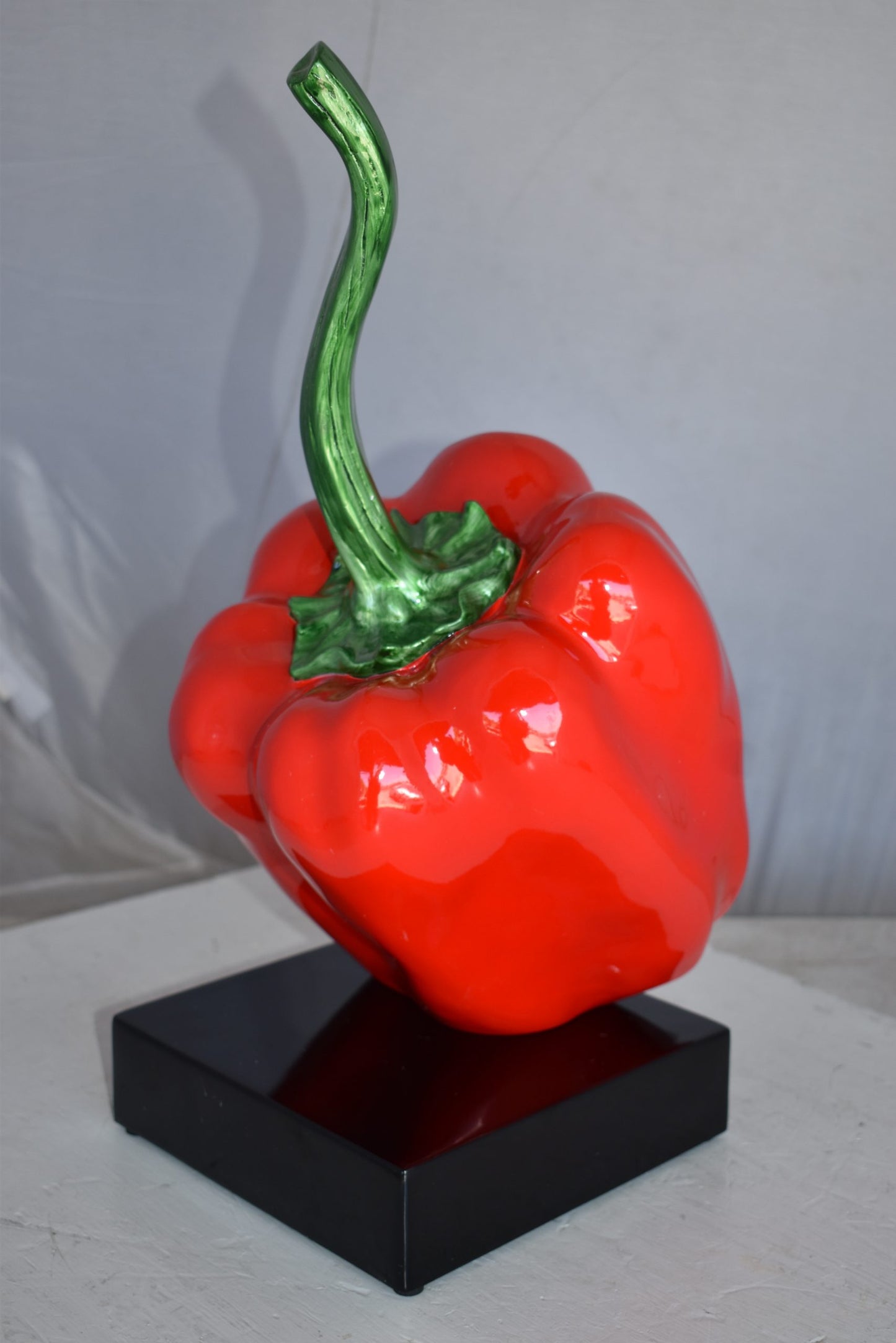 Modern Look of a Giant Red Pepper Mounted on A Base Size: 10" x 12" x 19"H