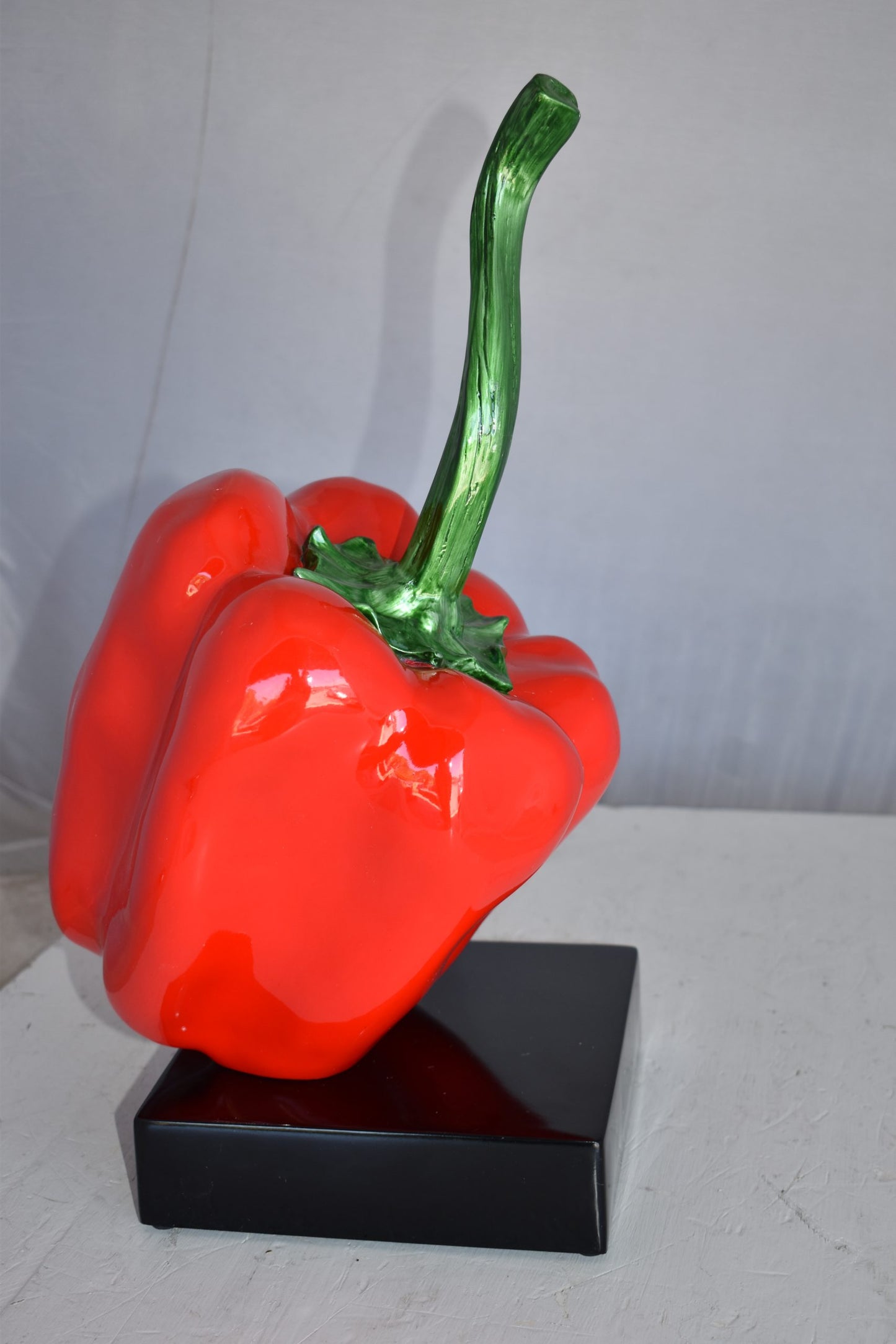 Modern Look of a Giant Red Pepper Mounted on A Base Size: 10" x 12" x 19"H
