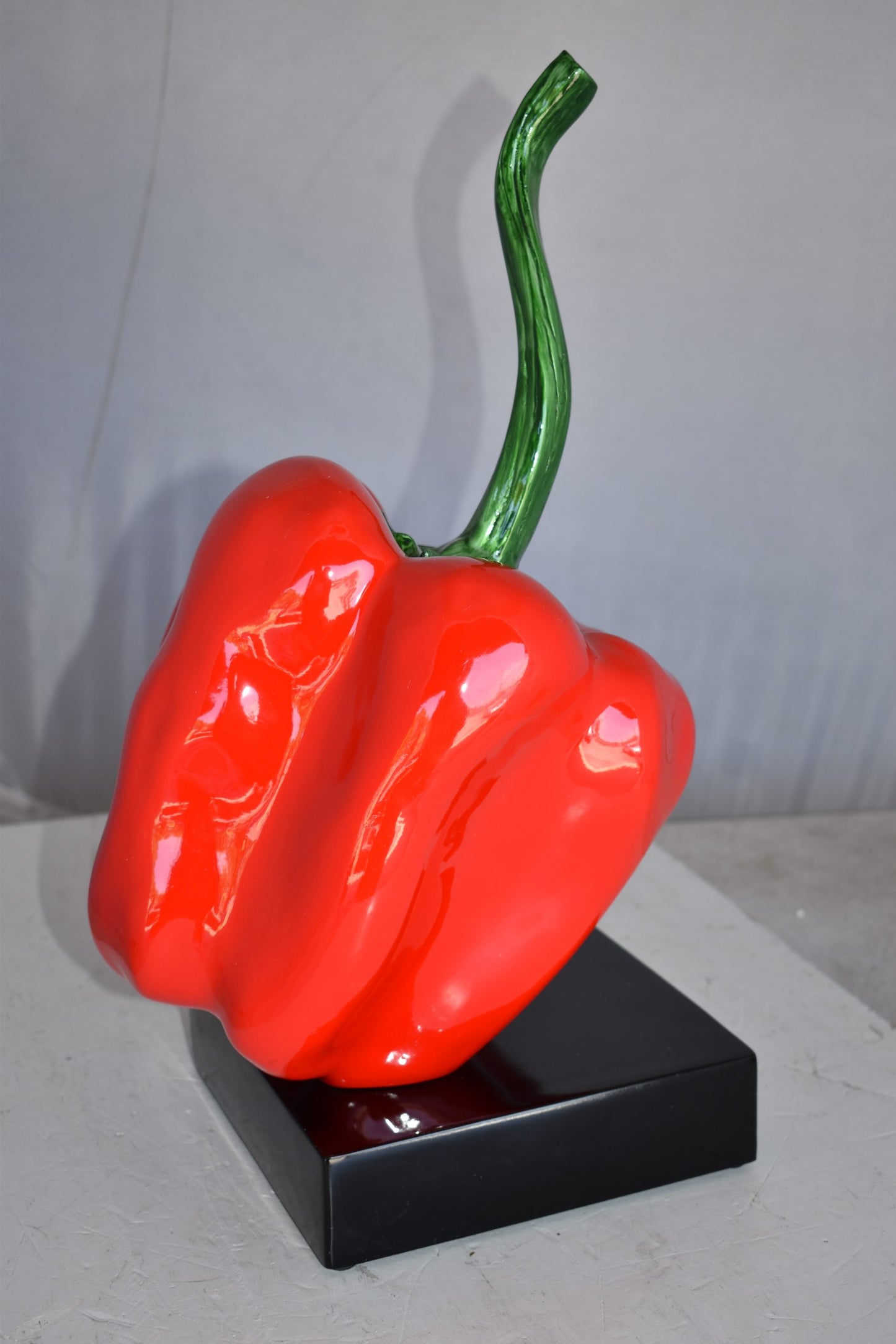Modern Look of a Giant Red Pepper Mounted on A Base Size: 10" x 12" x 19"H
