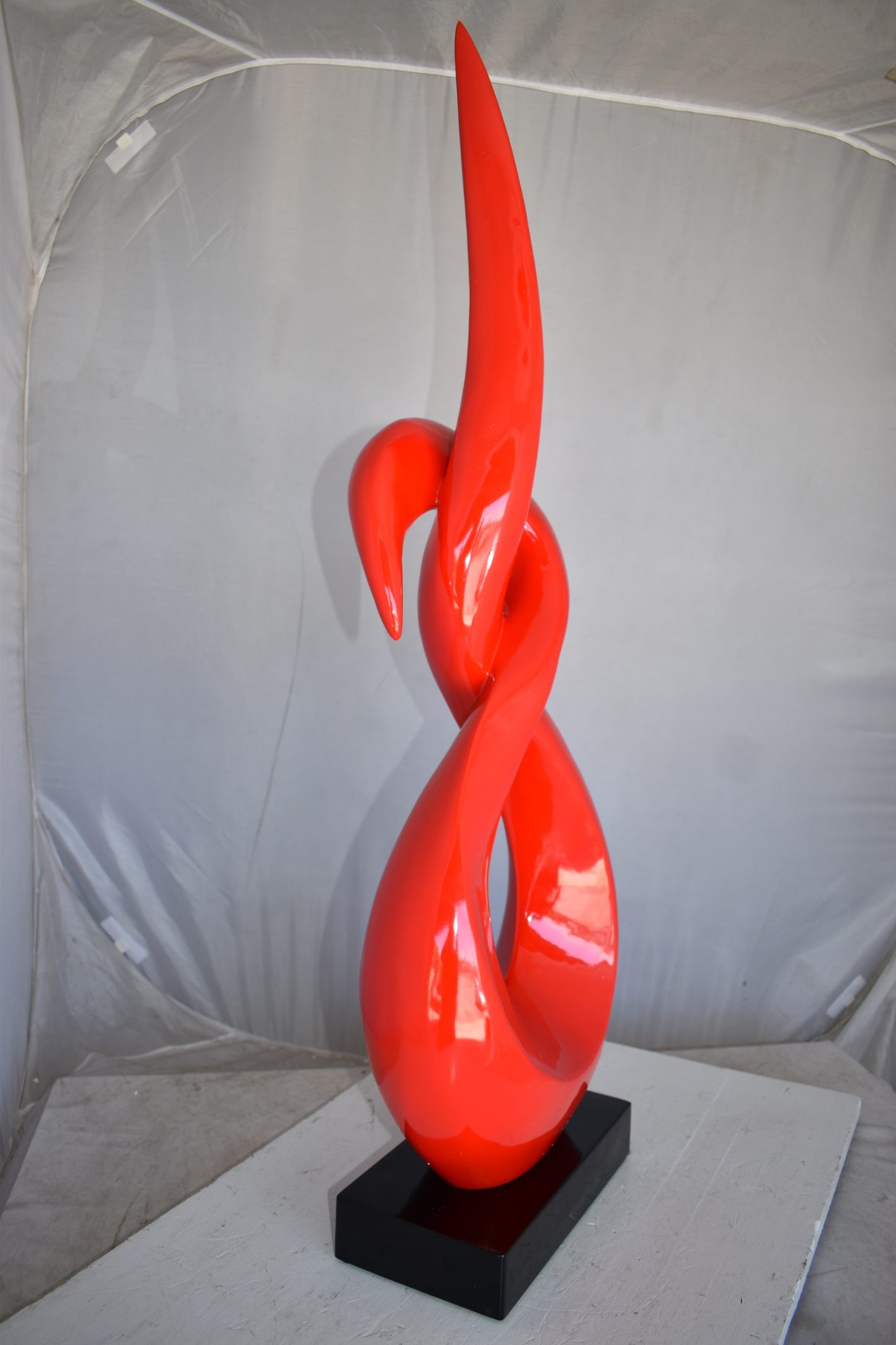 Modern Art Red Eternity Sculpture Made of Resin on A Base Size: 13" x 7" x 42"H