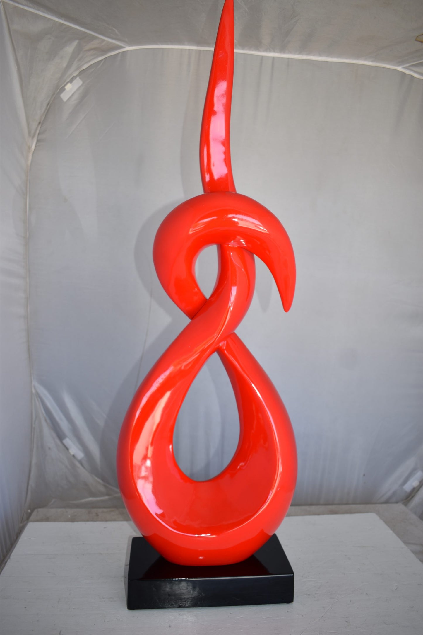 Modern Art Red Eternity Sculpture Made of Resin on A Base Size: 13" x 7" x 42"H