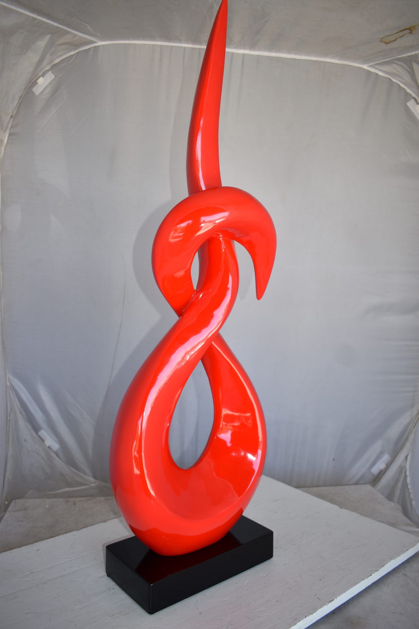 Modern Art Red Eternity Sculpture Made of Resin on A Base Size: 13" x 7" x 42"H