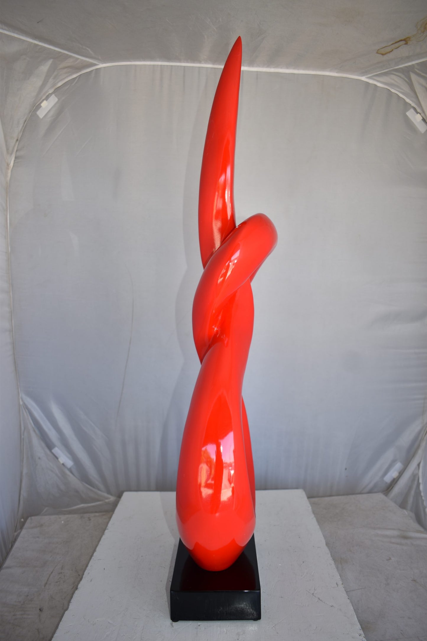 Modern Art Red Eternity Sculpture Made of Resin on A Base Size: 13" x 7" x 42"H