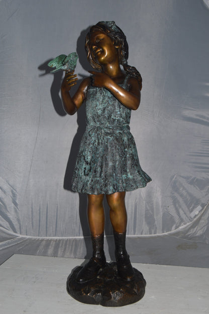 Girl Holding a Bird Bronze Statue -  Size: 12"L x 12"W x 34"H.