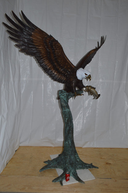 Eagle on a Tree with white face Bronze Statue -  Size: 40"L x 70"W x 90"H.