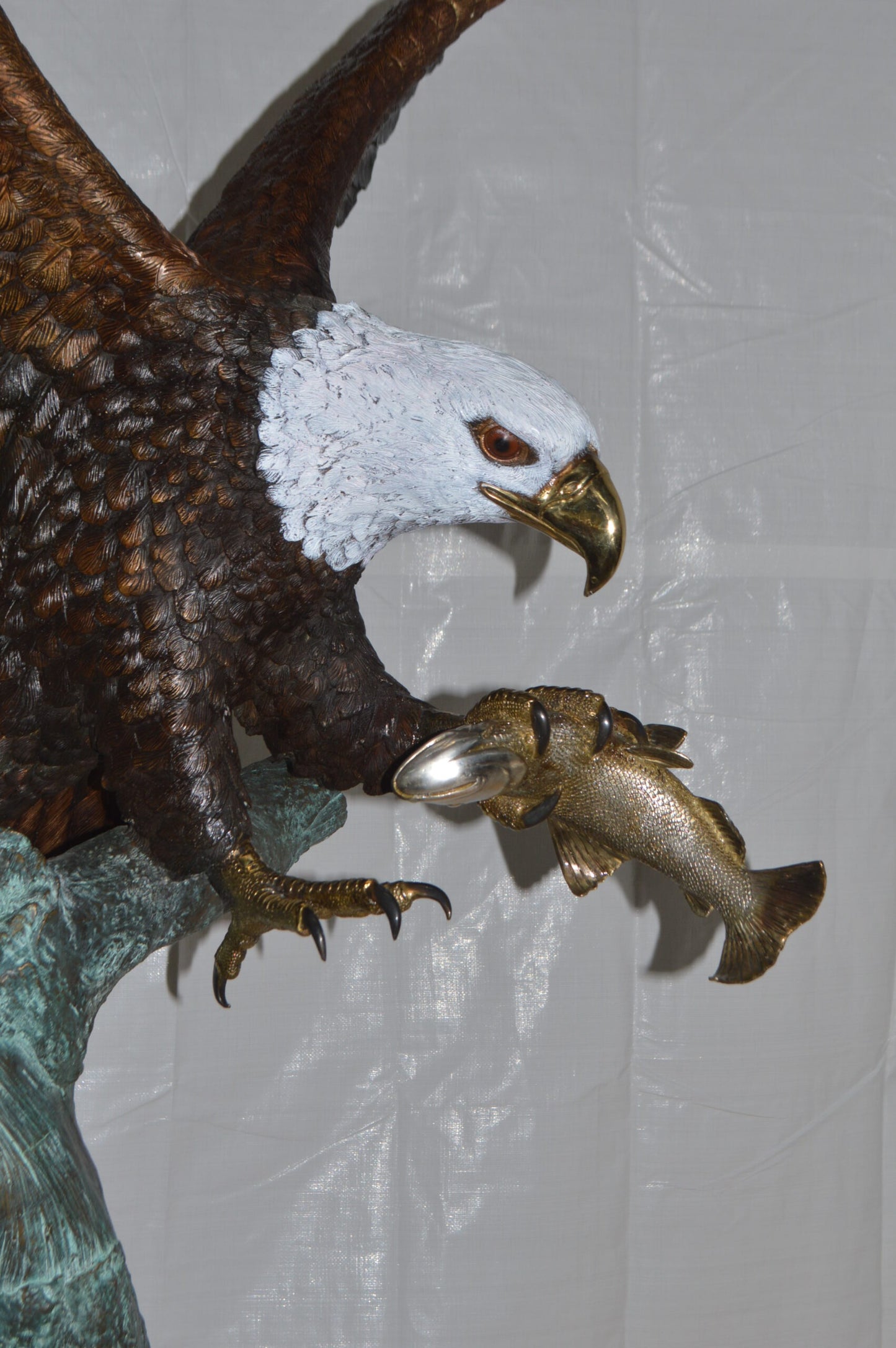 Eagle on a Tree with white face Bronze Statue -  Size: 40"L x 70"W x 90"H.
