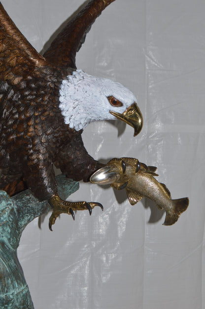 Eagle on a Tree with white face Bronze Statue -  Size: 40"L x 70"W x 90"H.