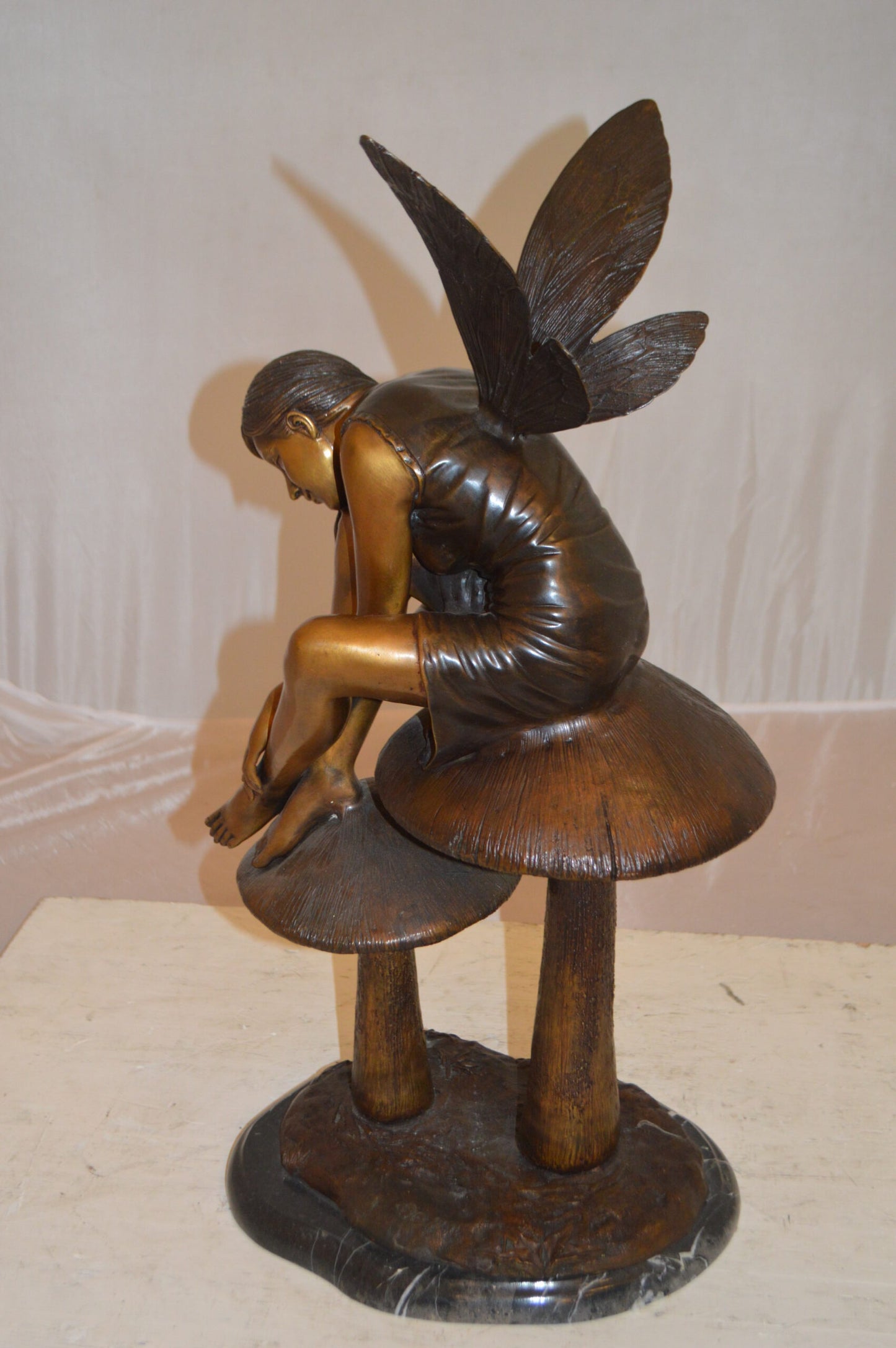 Fairy Sitting On Mushrooms Bronze Statue -  Size: 12"L x 9"W x 24"H.
