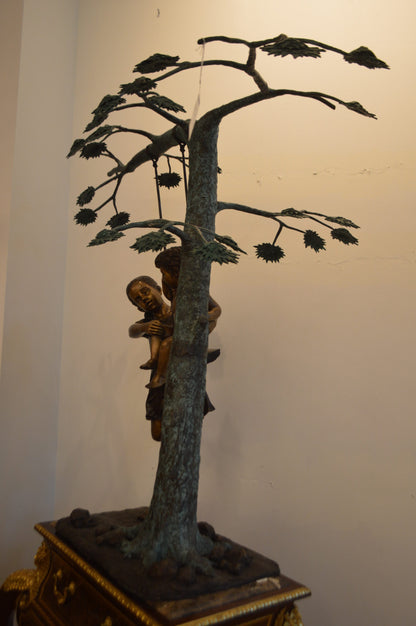 Swing Set Under A Three Bronze Statue -  Size: 60"L x 33"W x 60"H.