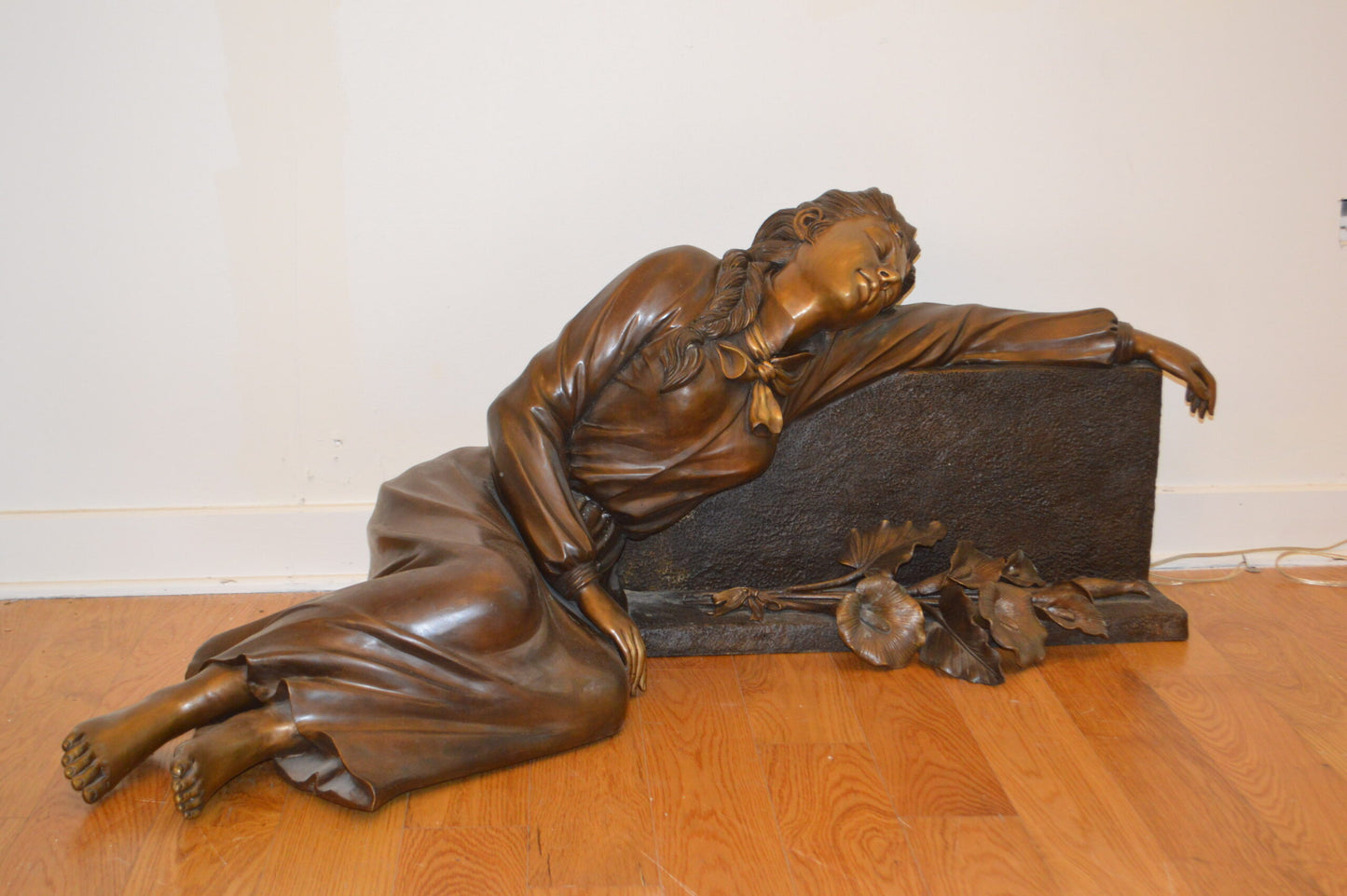 Lady With Flowers on Tombstone Bronze Statue -  Size: 62"L x 32"W x 24"H.