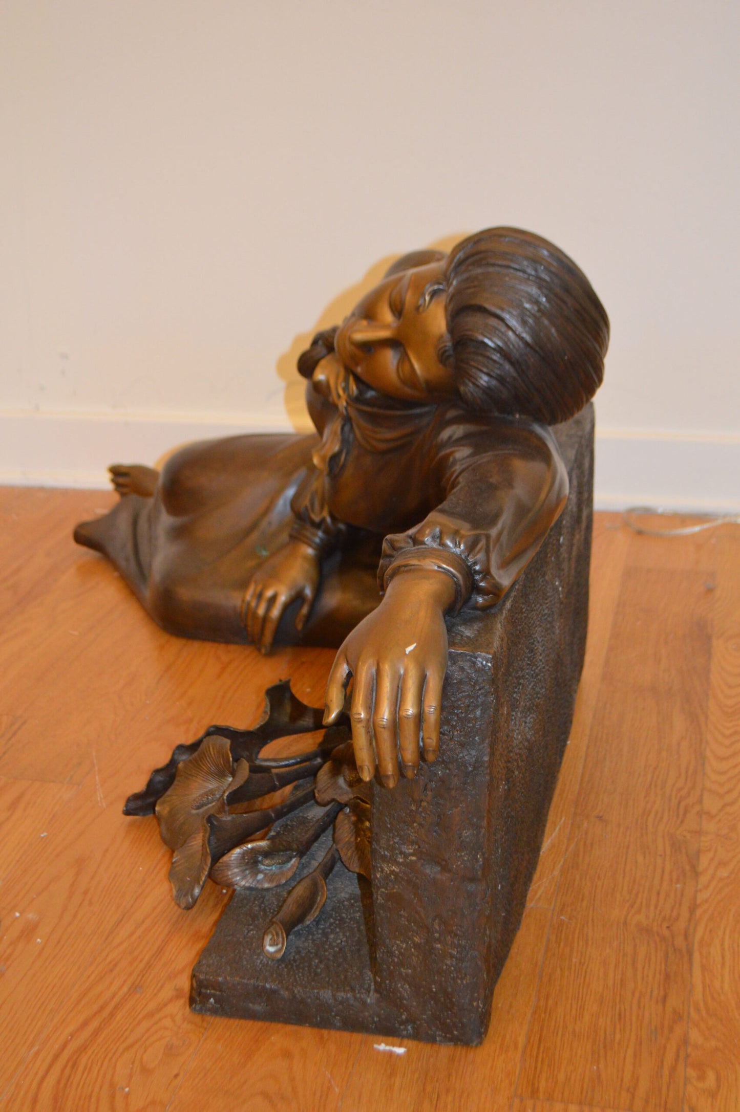 Lady With Flowers on Tombstone Bronze Statue -  Size: 62"L x 32"W x 24"H.