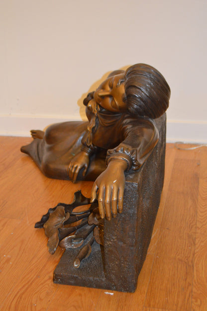 Lady With Flowers on Tombstone Bronze Statue -  Size: 62"L x 32"W x 24"H.