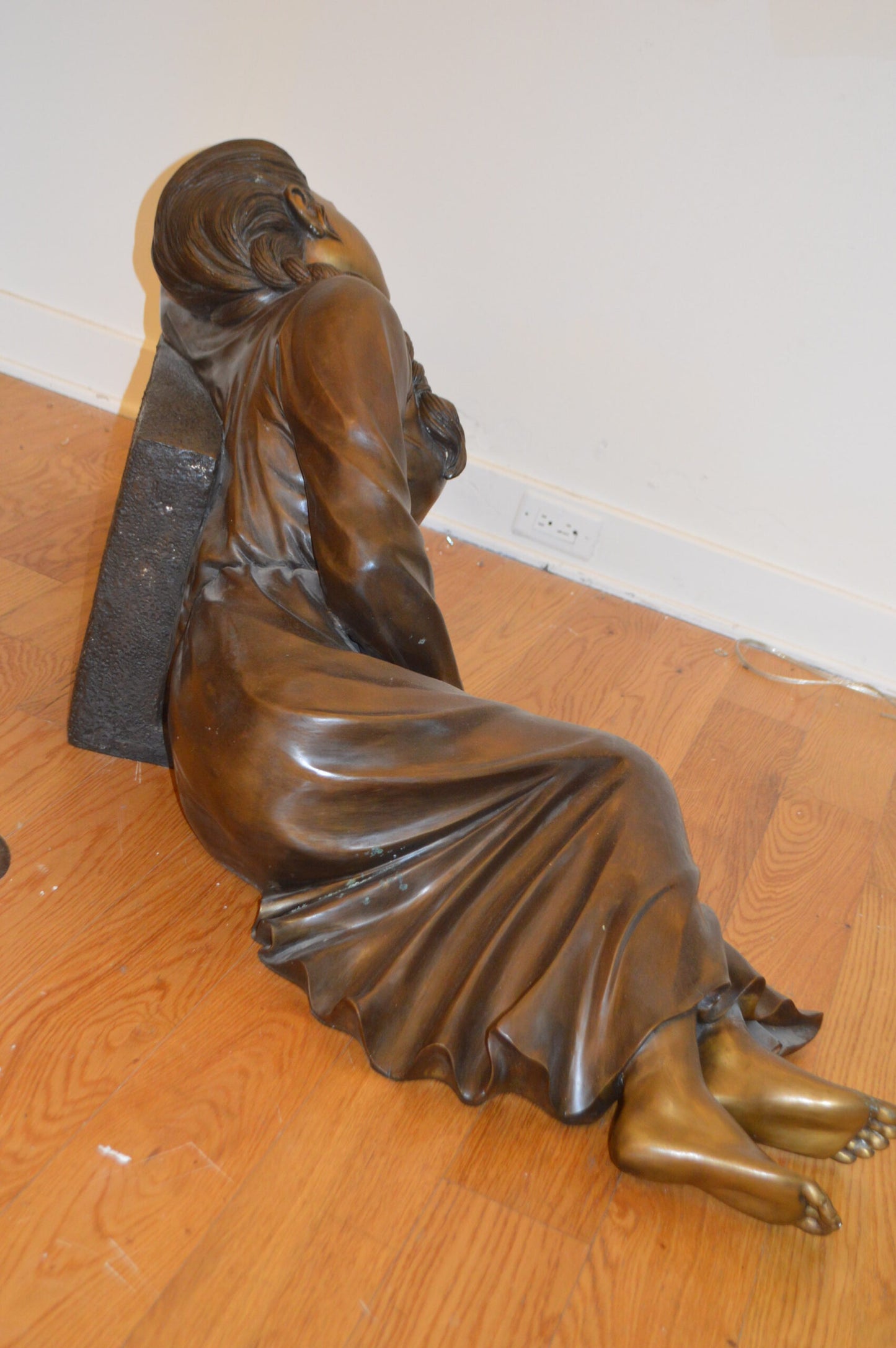 Lady With Flowers on Tombstone Bronze Statue -  Size: 62"L x 32"W x 24"H.