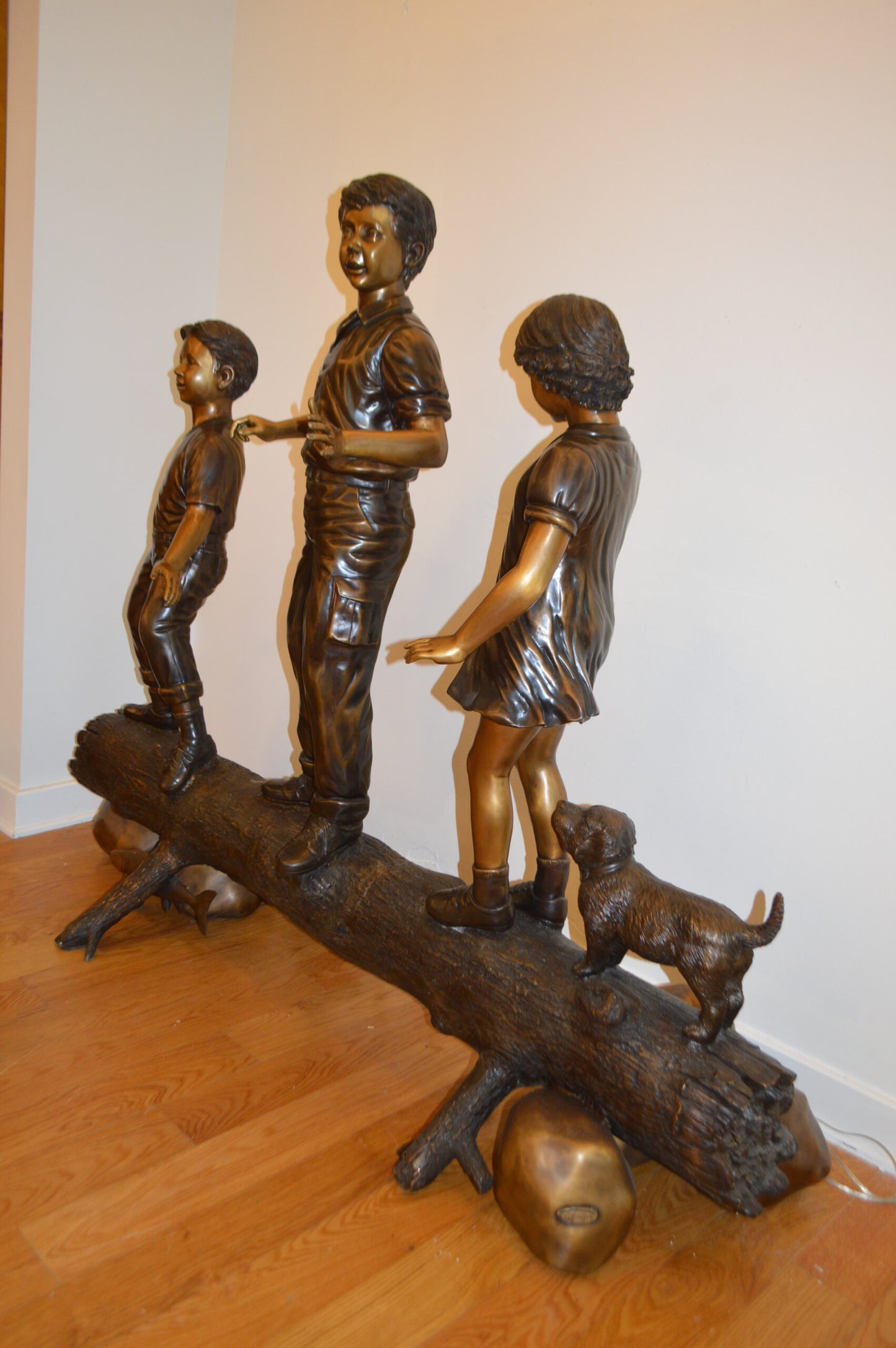 Three Kids With A Dog On A Log Bronze Statue -  Size: 78"L x 26"W x 62"H.
