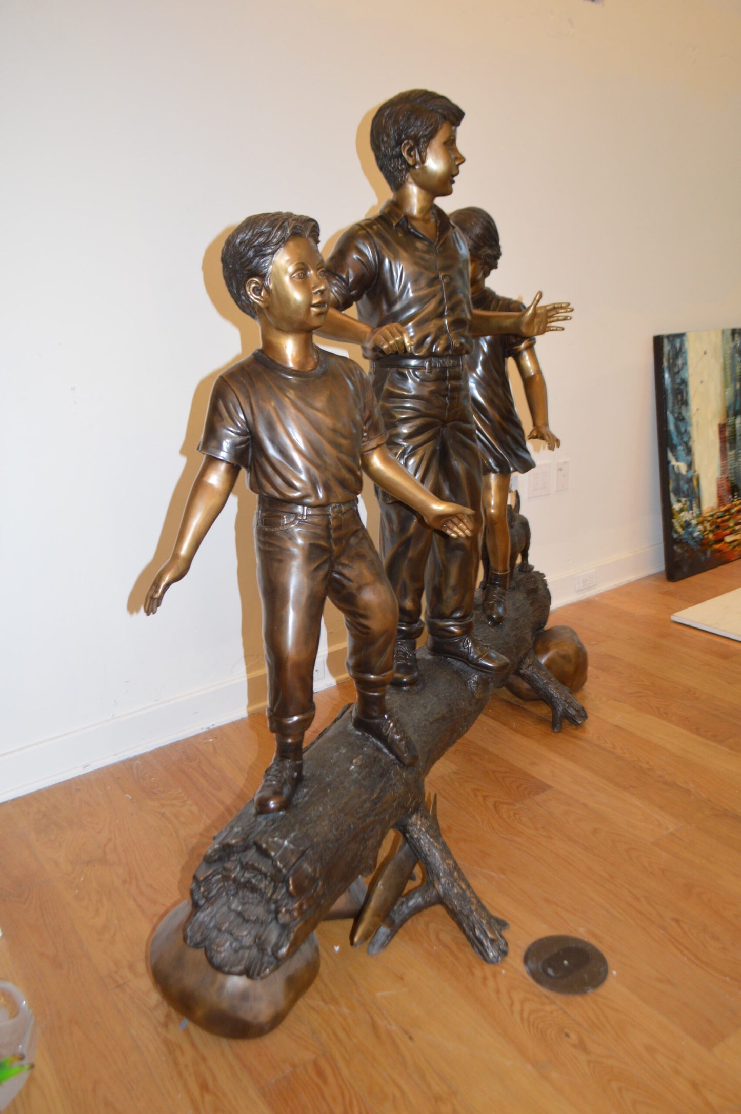 Three Kids With A Dog On A Log Bronze Statue -  Size: 78"L x 26"W x 62"H.