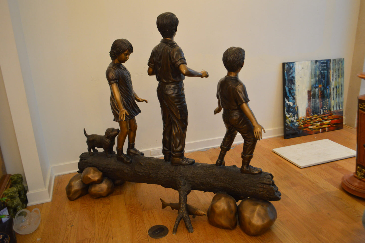 Three Kids With A Dog On A Log Bronze Statue -  Size: 78"L x 26"W x 62"H.