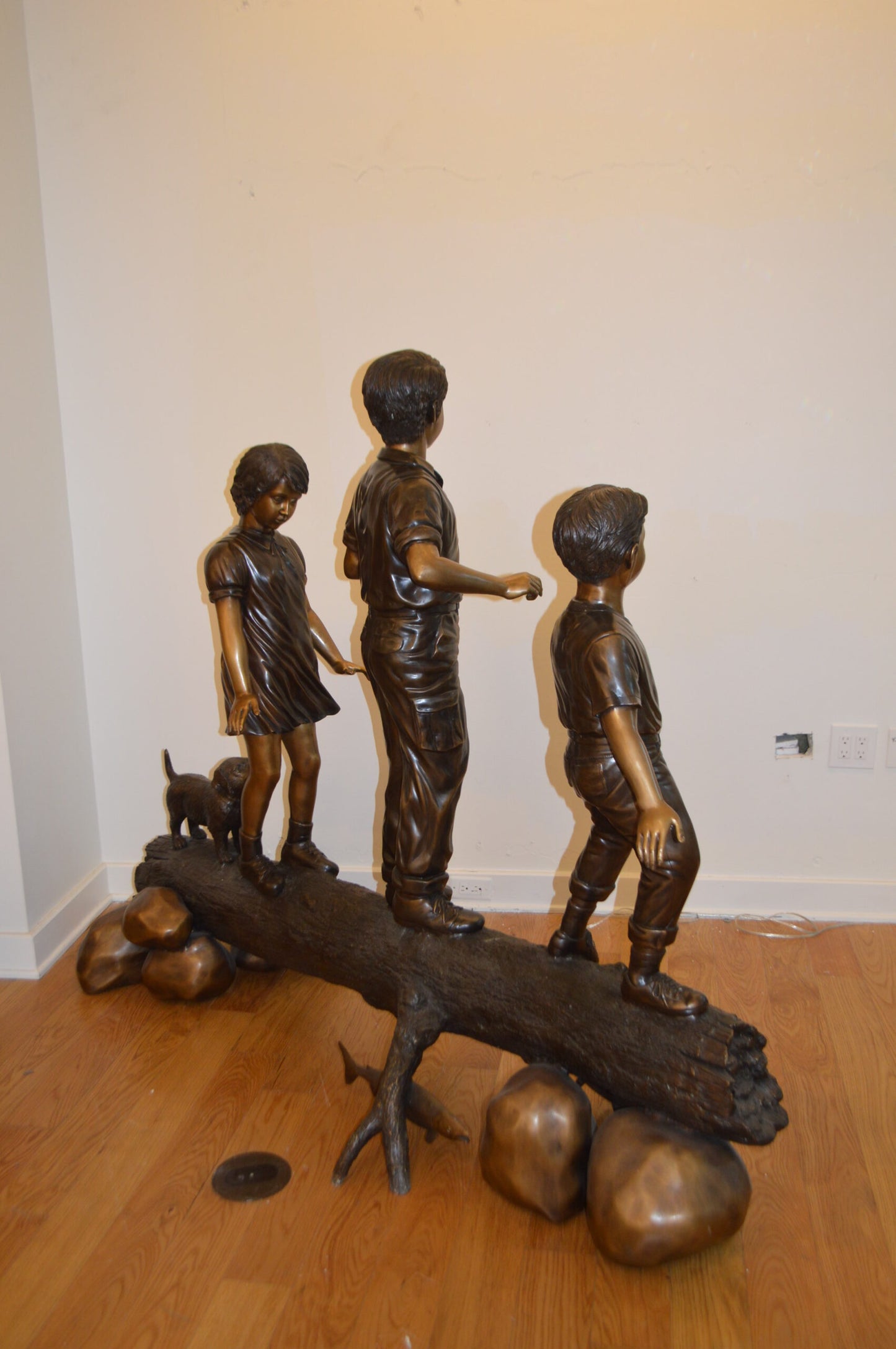 Three Kids With A Dog On A Log Bronze Statue -  Size: 78"L x 26"W x 62"H.