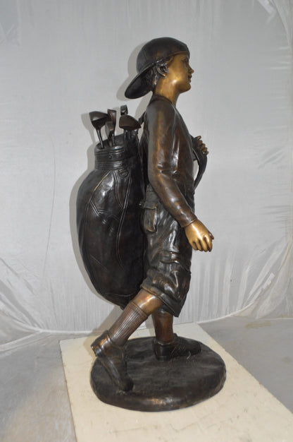 Boy Carrying A Golf Bag Bronze Statue -  Size: 15"L x 15"W x 38"H.