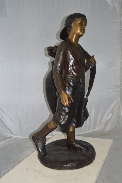 Boy Carrying A Golf Bag Bronze Statue -  Size: 15"L x 15"W x 38"H.