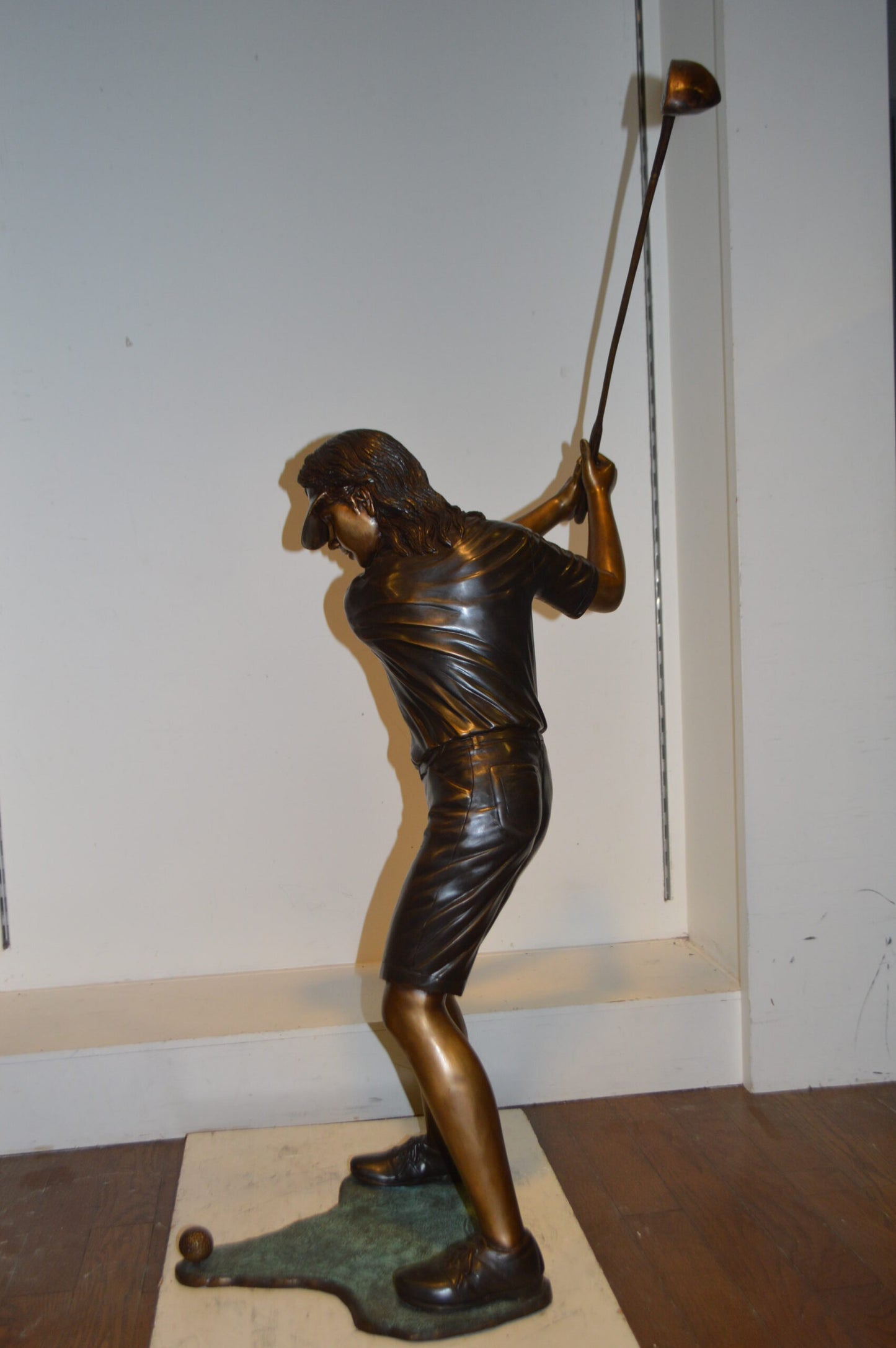 Susan Plays Golf Bronze Statue -  Size: 18"L x 23"W x 47"H.