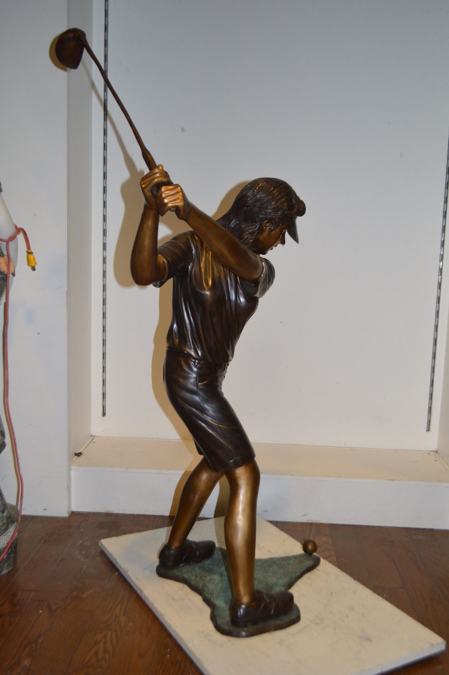 Susan Plays Golf Bronze Statue -  Size: 18"L x 23"W x 47"H.