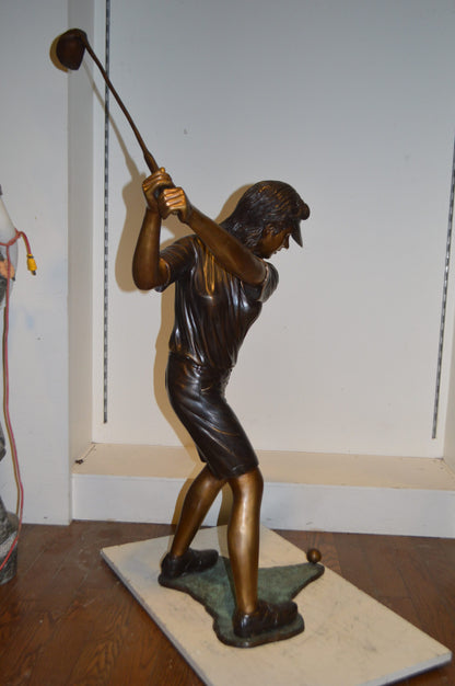 Susan Plays Golf Bronze Statue -  Size: 18"L x 23"W x 47"H.