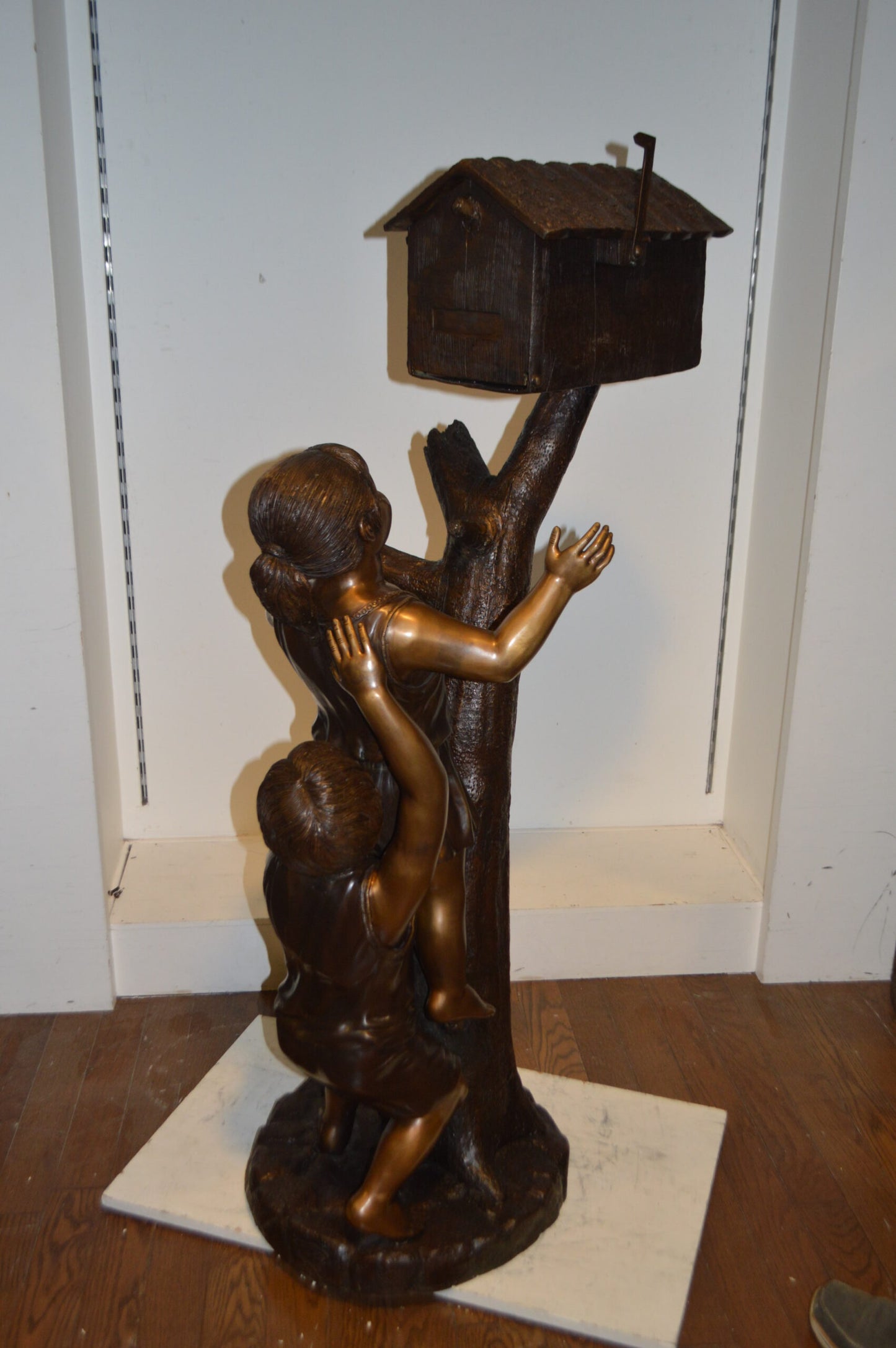 Two Kids Climbing A Mailbox -  Size: 30"L x 21"W x 57"H.