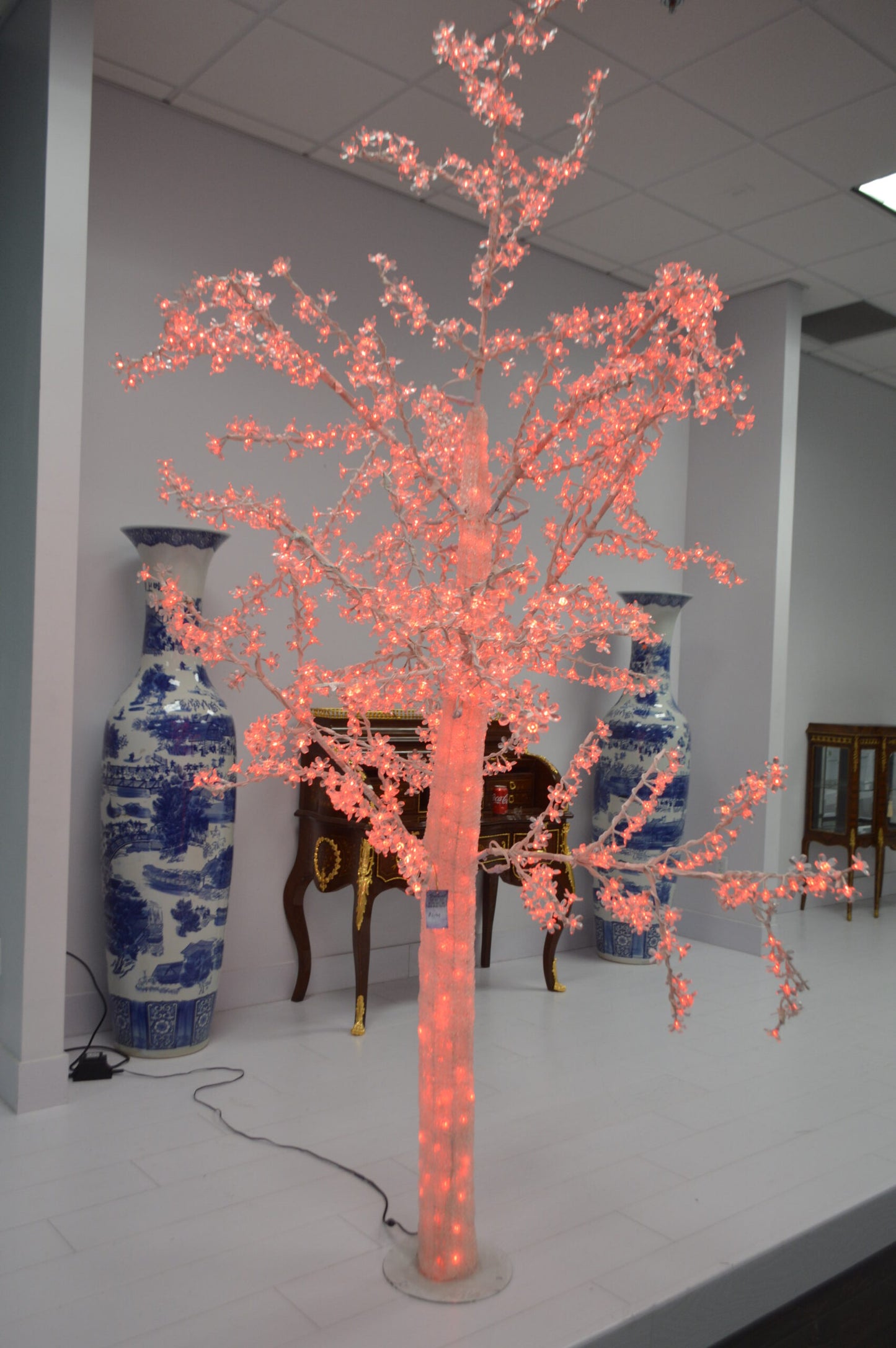 White Tree With Red LED Lights -  Size: 70"L x 65"W x 120"H.