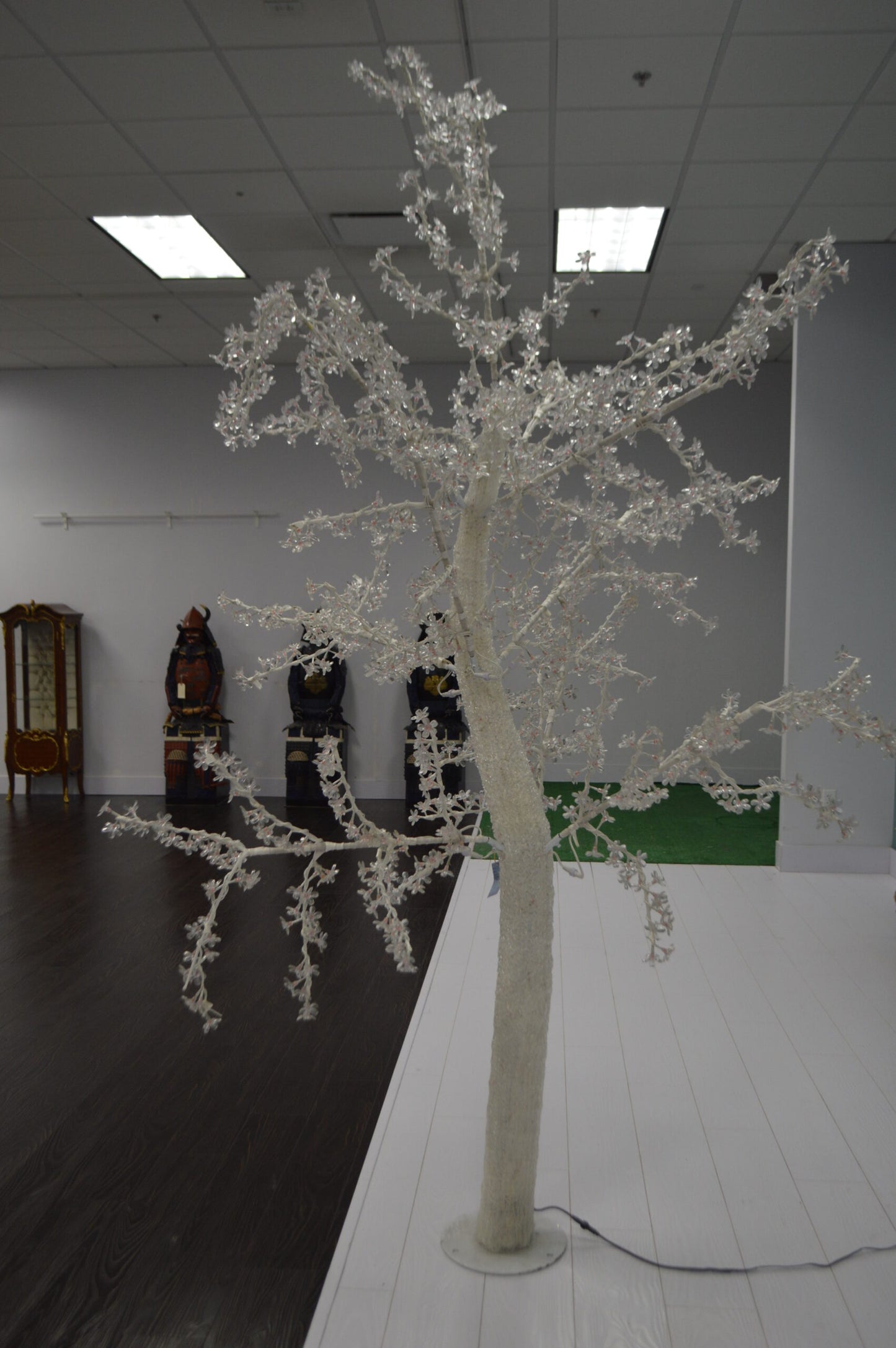 White Tree With Red LED Lights -  Size: 70"L x 65"W x 120"H.