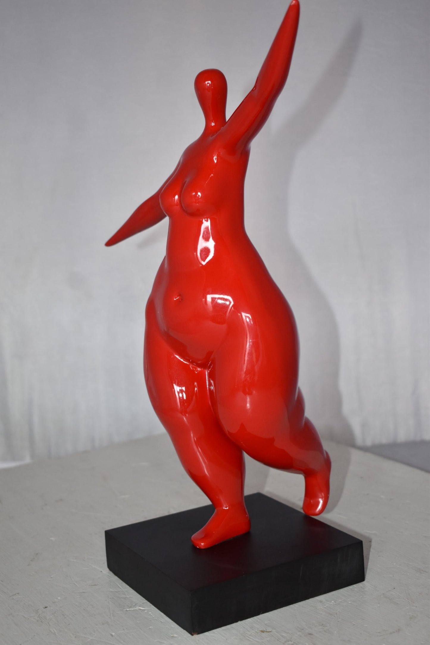 Modern Art Voluptuous Red Lady Hand Up Resin Statue Size: 14" x 5" x 16"H
