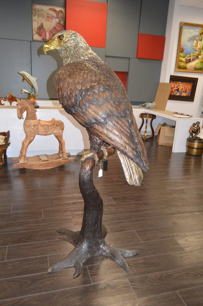 Large Eagle Standing On A Branch Bronze Statue -  Size: 30"L x 40"W x 70"H.