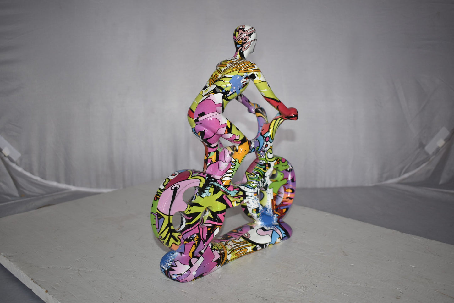 Modern Art Graffiti Bicycle and Rider Statue Made of Resin Size: 10" x 4" x 15"H