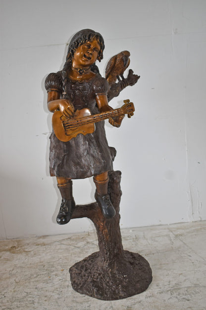 Girl on a Tree Playing the Ukulele with a Parrot Bronze Statue 25" x 23" x 50"H