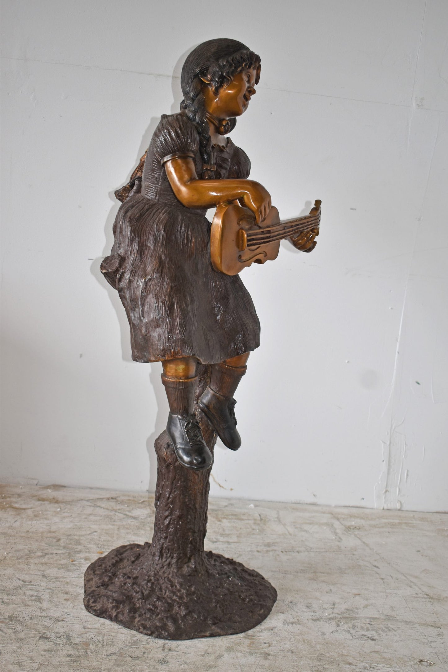 Girl on a Tree Playing the Ukulele with a Parrot Bronze Statue 25" x 23" x 50"H