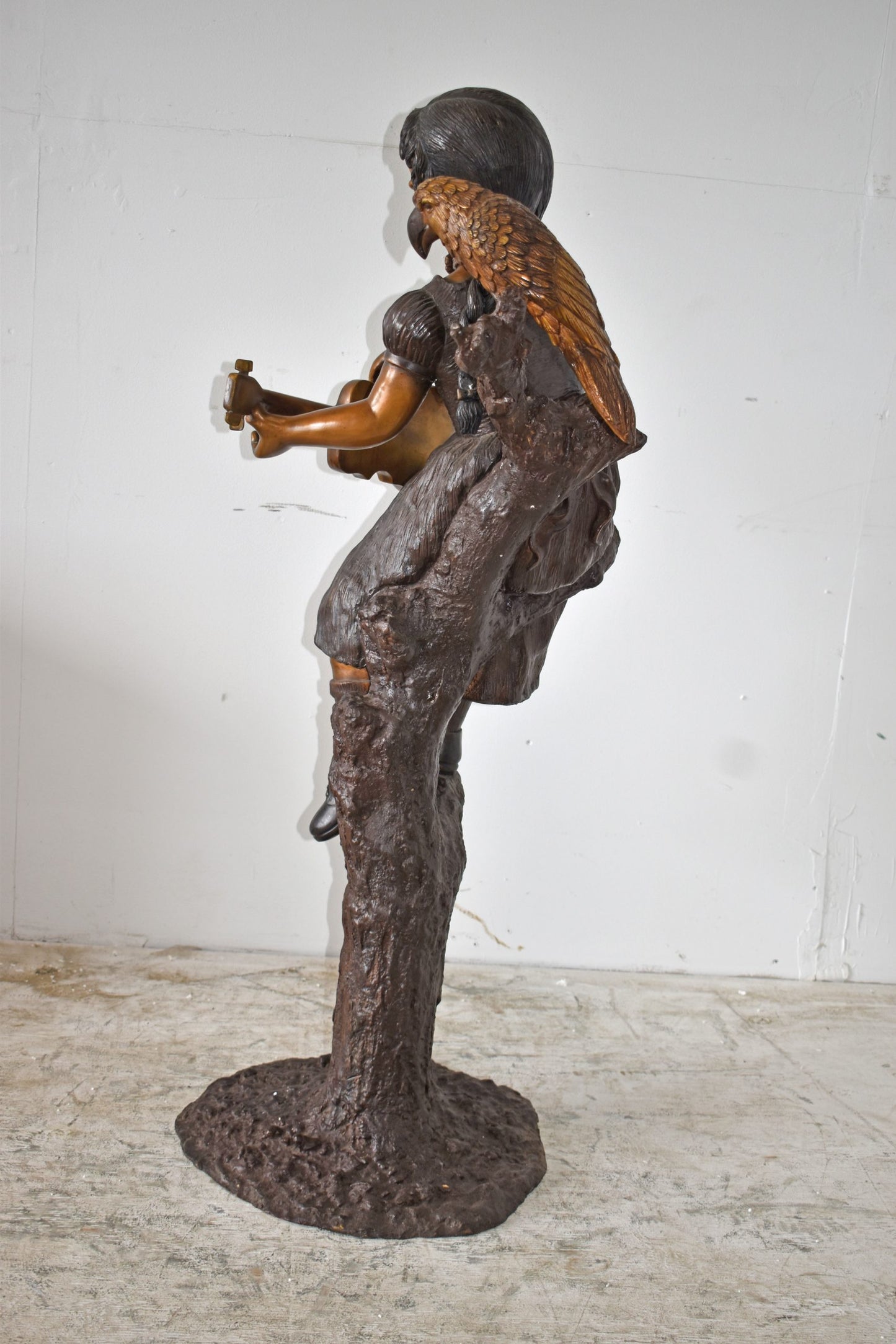 Girl on a Tree Playing the Ukulele with a Parrot Bronze Statue 25" x 23" x 50"H