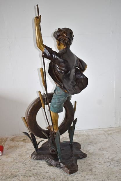 Pirate Sitting on a Life Saver Wheel Bronze Statue Size: 24" x 28" x 57"H