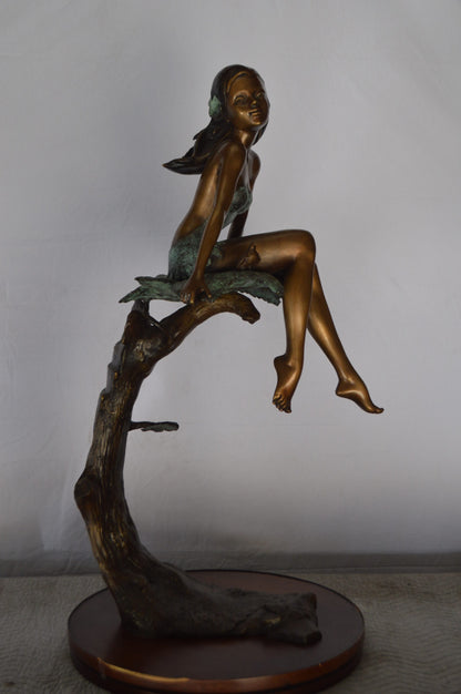 Girl on Maple Leaf Bronze Statue -  Size: 23"L x 18"W x 44"H.