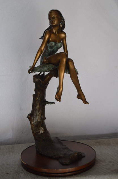 Girl on Maple Leaf Bronze Statue -  Size: 23"L x 18"W x 44"H.