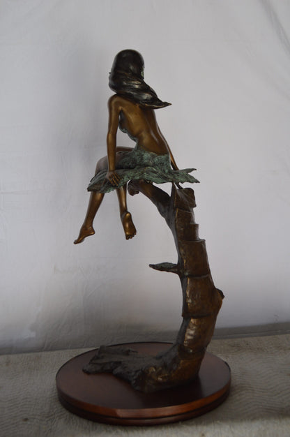 Girl on Maple Leaf Bronze Statue -  Size: 23"L x 18"W x 44"H.
