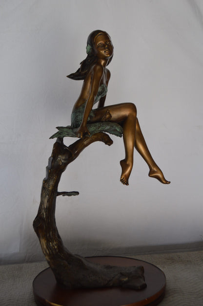 Girl on Maple Leaf Bronze Statue -  Size: 23"L x 18"W x 44"H.