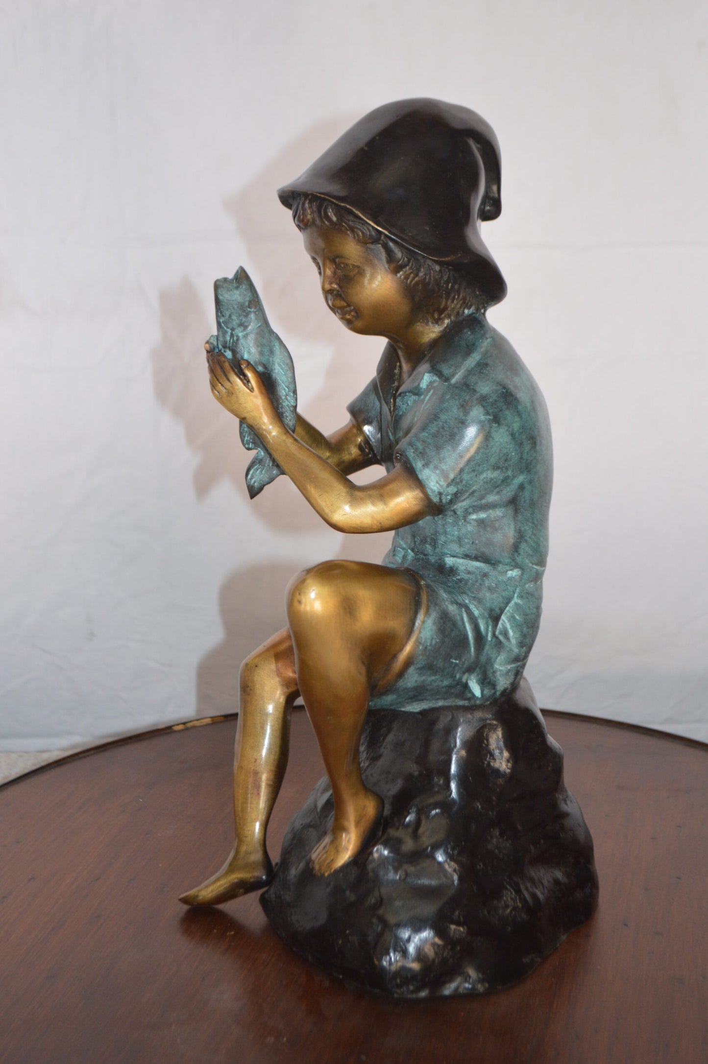 Boy Holding a Fish Bronze Statue Fountain -  Size: 8"L x 9"W x 18"H.