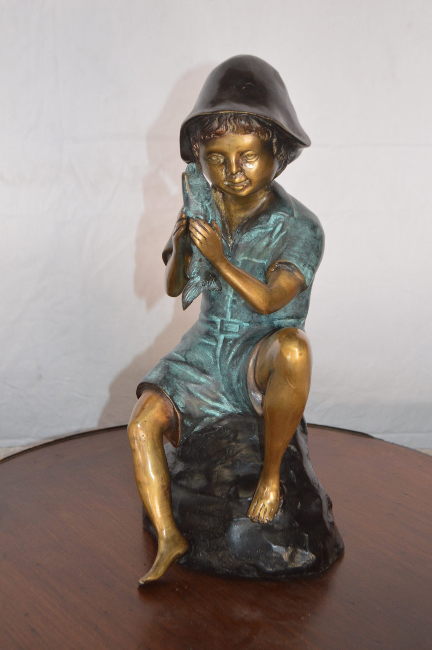 Boy Holding a Fish Bronze Statue Fountain -  Size: 8"L x 9"W x 18"H.