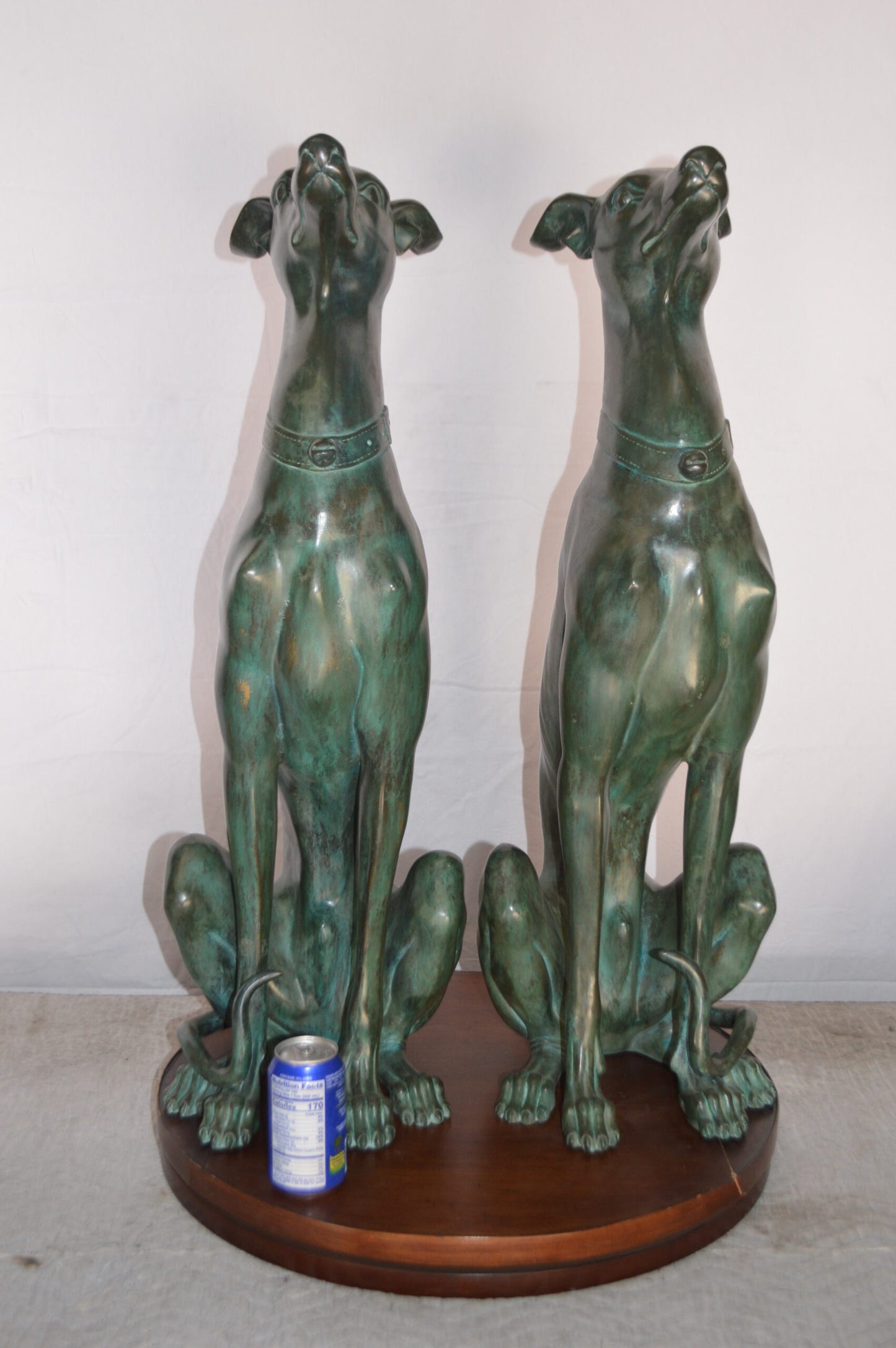 Pair of Greyhound dogs sitting Bronze Statue -  Size: 12"L x 12"W x 35"H.