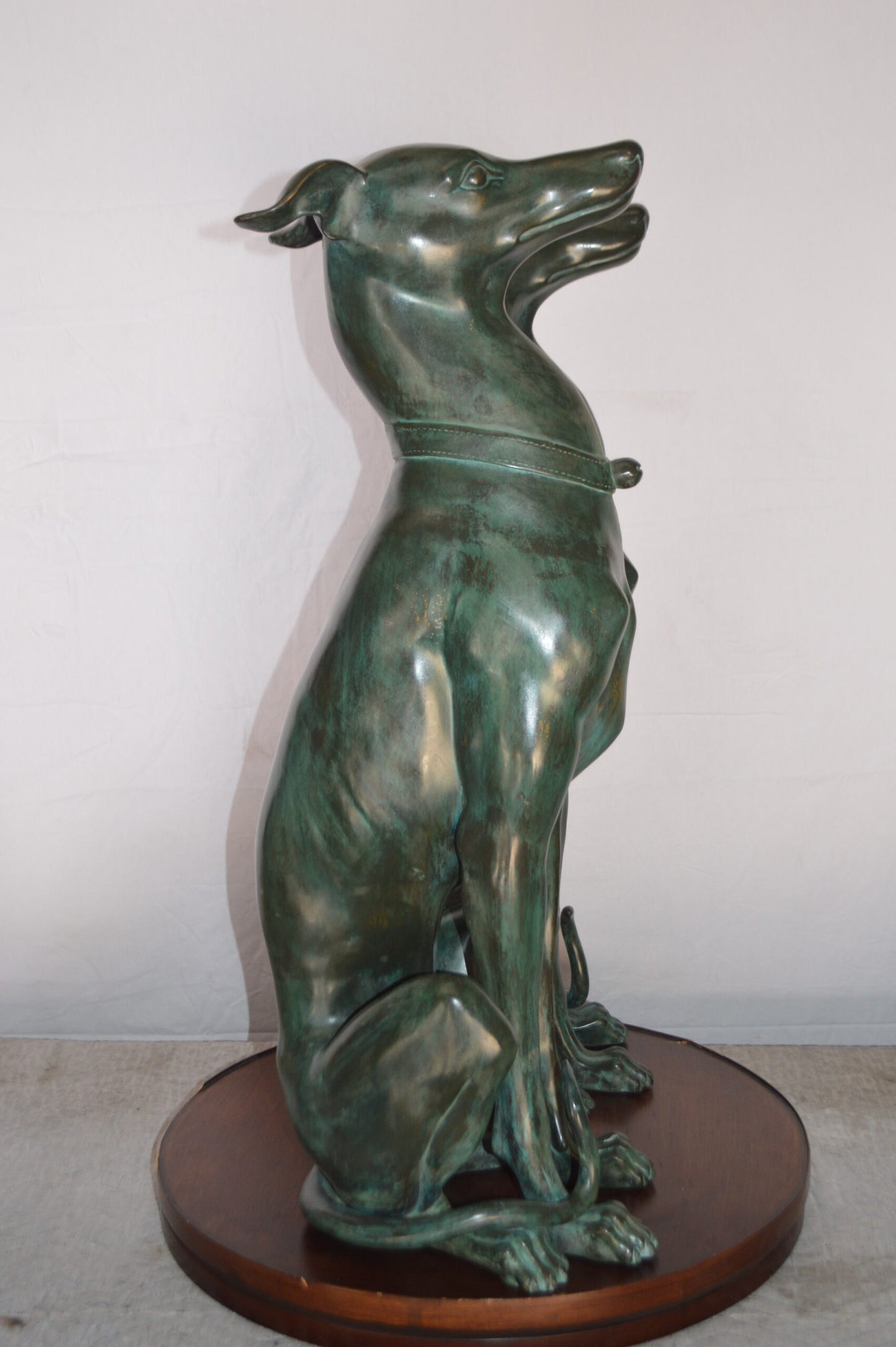 Pair of Greyhound dogs sitting Bronze Statue -  Size: 12"L x 12"W x 35"H.