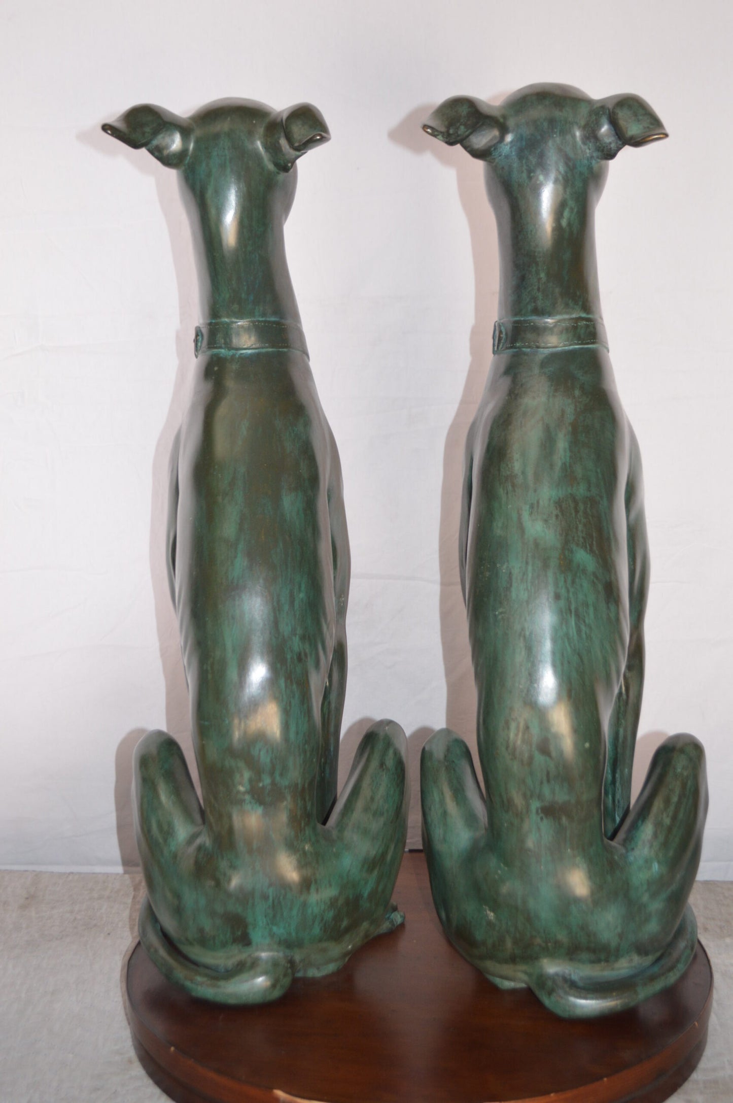 Pair of Greyhound dogs sitting Bronze Statue -  Size: 12"L x 12"W x 35"H.