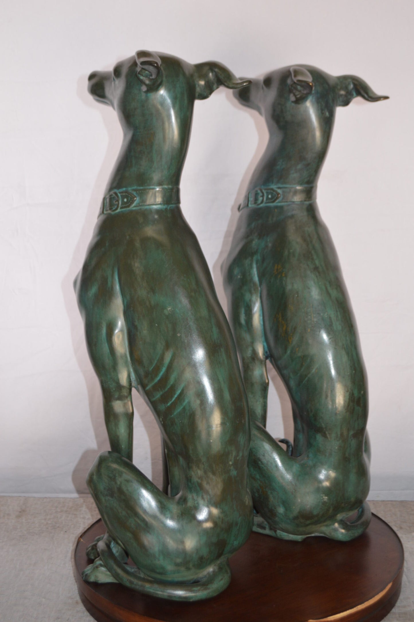 Pair of Greyhound dogs sitting Bronze Statue -  Size: 12"L x 12"W x 35"H.